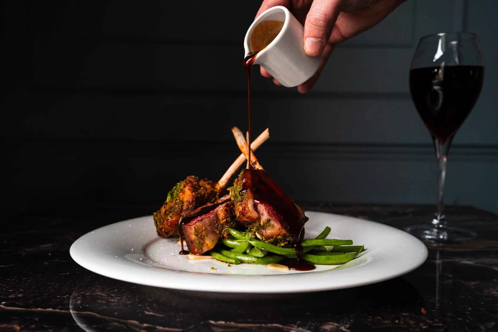 Locally sourced lamb dish with seasonal vegetables at Downham Hall restaurant Essex