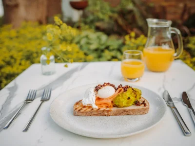 Avocado and poached egg on toast served outdoors at Downham Hall Essex