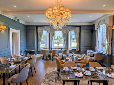 Elegant De Beauvoir Suite dining room at Downham Hall restaurant in Essex